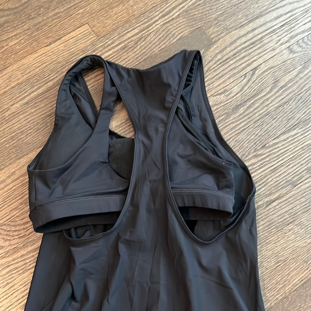 Lululemon black tank with open bottom size 4
